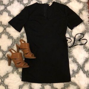 V -neck jumper , runs small